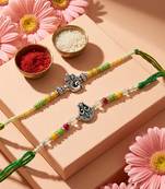 set of 2 multicolor religious thread rakhi with roli chawal chandan mishri