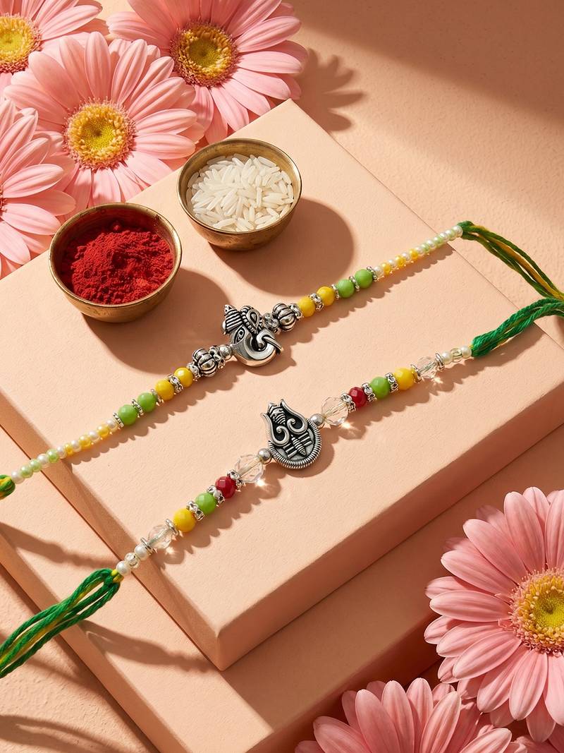 set of 2 multicolor religious thread rakhi with roli chawal chandan mishri