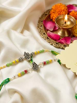 set of 2 multicolor religious thread rakhi with roli chawal chandan mishri 2