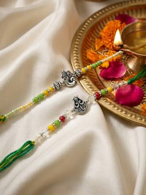 set of 2 multicolor religious thread rakhi with roli chawal chandan mishri 4