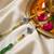 set of 2 multicolor religious thread rakhi with roli chawal chandan mishri