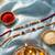 set of 2 silver toned religious rakhi thread rakhi roli chawal chandan mishri