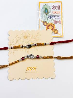 set of 2 silver toned religious rakhi thread rakhi roli chawal chandan mishri 3