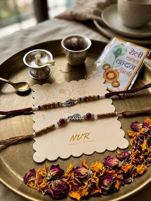 set of 2 silver toned religious rakhi thread rakhi roli chawal chandan mishri 4