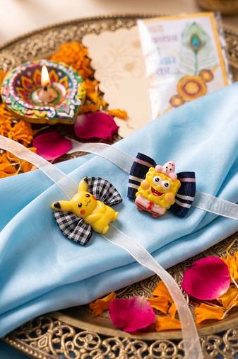 set of 2 pikachu design kids rakhi with roli chawal chandan mishri