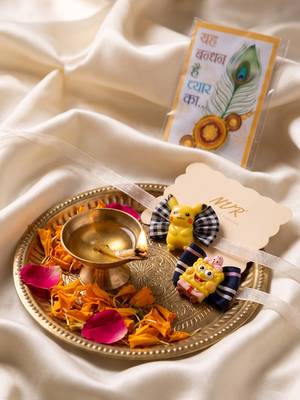 set of 2 pikachu design kids rakhi with roli chawal chandan mishri 3