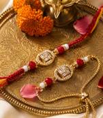 set of 2 artificial stones & beads swastik bhaiya bhabhi rakhi with roli chawal