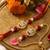 set of 2 artificial stones & beads swastik bhaiya bhabhi rakhi with roli chawal