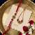 set of 2 ad drawstring bhaiya bhabhi rakhi with roli chawal chandan mishri