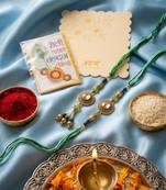 set of 2 ad drawstring bhaiya bhabhi rakhi with roli chawal chandan mishri