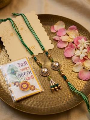 set of 2 ad drawstring bhaiya bhabhi rakhi with roli chawal chandan mishri 3