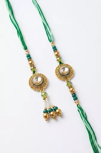 set of 2 ad drawstring bhaiya bhabhi rakhi with roli chawal chandan mishri