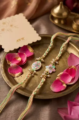set of 2 meenakari floral thread rakhi with roli chawal chandan mishri