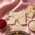 set of 2 artificial beads thread rakhi with roli chawal chandan mishri
