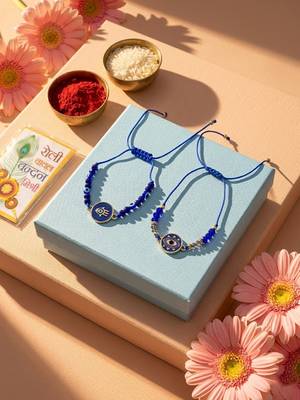 set of 2 blue evil eye thread rakhi with roli chawal chandan mishri 1