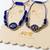 set of 2 blue evil eye thread rakhi with roli chawal chandan mishri