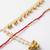 set of 2 pearls gold toned bhaiya bhabhi rakhi with roli chawal chandan mishri