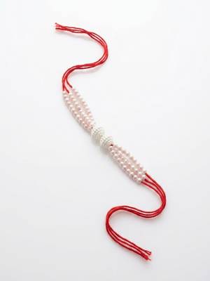 white pearls & red thread rakhi with roli chawal chandan mishri 3