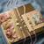 set of 3 white pearls thread rakhi with roli chawal chandan mishri