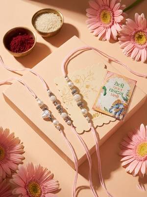 set of 3 white pearls thread rakhi with roli chawal chandan mishri 3