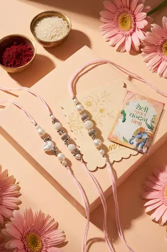 set of 3 white pearls thread rakhi with roli chawal chandan mishri