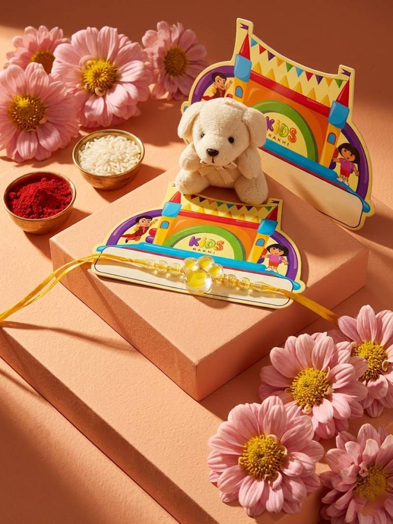transparent beads kids rakhi with roli chawal chandan mishri