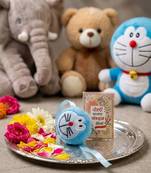 kids doremon design thread rakhi with roli chawal chandan mishri