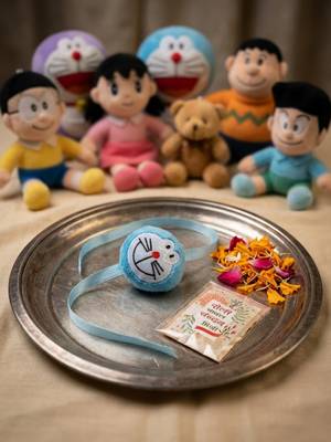 kids doremon design thread rakhi with roli chawal chandan mishri 3