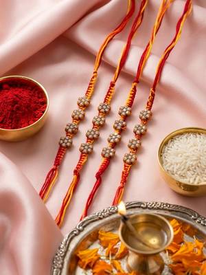 set of 4 artificial stones floral design thread rakhi with roli chawal chandan mishri 1