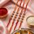 set of 4 artificial stones floral design thread rakhi with roli chawal chandan mishri