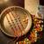 set of 4 artificial stones floral design thread rakhi with roli chawal chandan mishri