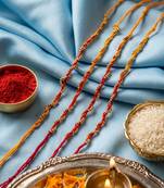 set of 4 red & yellow thread rakhi with roli chawal chandan mishri