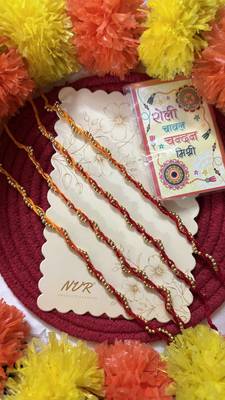 set of 4 yellow & red thread rakhi with roli chawal chandan mishri 1