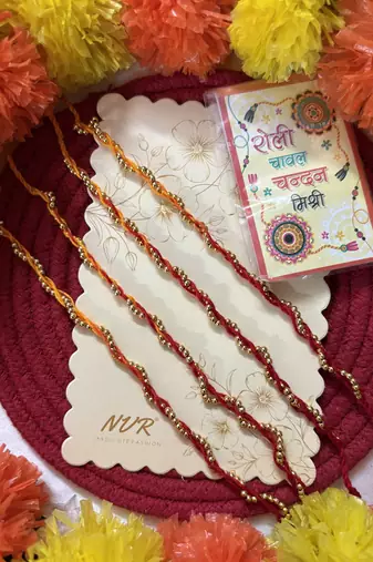 set of 4 yellow & red thread rakhi with roli chawal chandan mishri