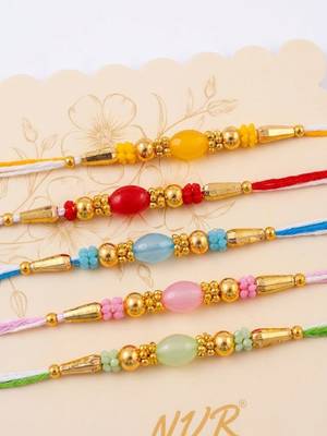 set of 5 multi artificial beads thread rakhi with roli chawal chandan mishri 1