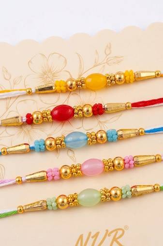 set of 5 multi artificial beads thread rakhi with roli chawal chandan mishri