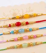 set of 5 multi artificial beads thread rakhi with roli chawal chandan mishri