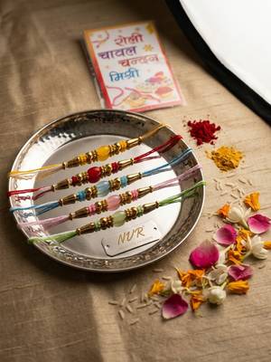 set of 5 multi artificial beads thread rakhi with roli chawal chandan mishri 4
