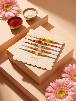 set of 5 multi artificial beads thread rakhi with roli chawal chandan mishri 5