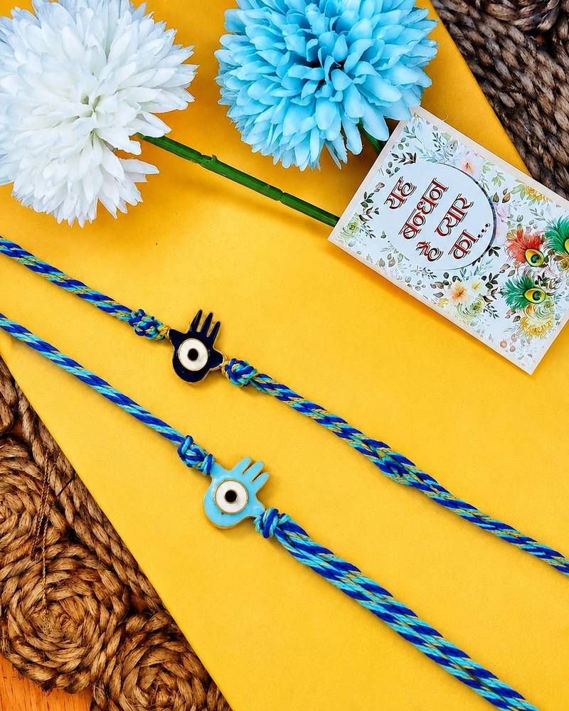 set of 2 evil eye & blue thread rakhi with roli chawal chandan mishri