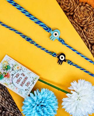 set of 2 evil eye & blue thread rakhi with roli chawal chandan mishri 2