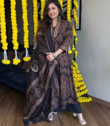 Rich black shade detailed with intricate traditional prints and motifs Kurta and pant and dupatta 