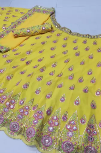 yellow georgette lehenga choli with embroidery and fancy dupatta
