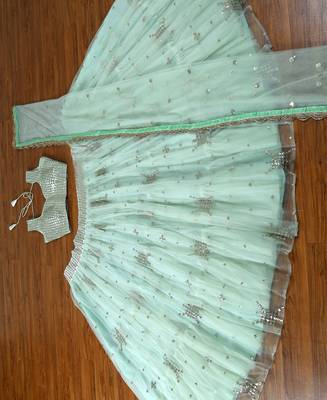 pista green net ruffle lehenga choli with embroidered dupatta 5
