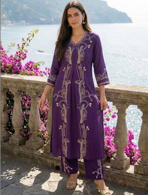 Women Printed Regular Beads and Stones Kurta with Palazzos 6