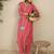 Women Solid V-Neck Regular Kurta with Trousers