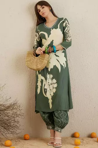 Women Floral Printed Regular Sequinned Kurta with Salwar