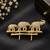 gold plated elephant family designer brooch pin with  ruby-colored stone accents   luxury animal  unisex brooch