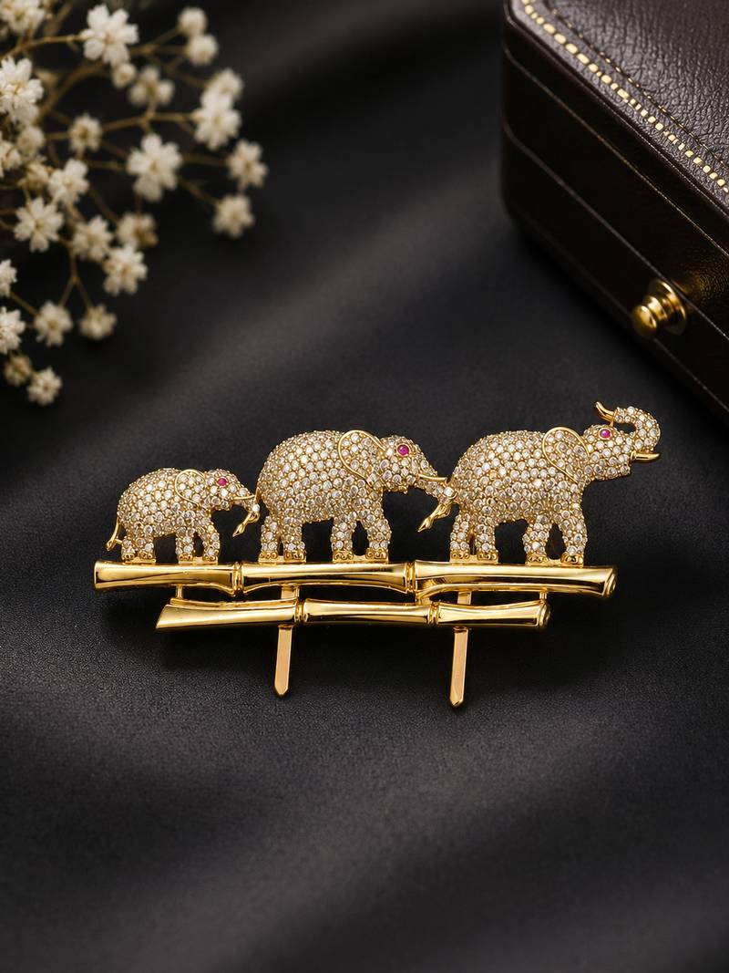 gold plated elephant family designer brooch pin with  ruby-colored stone accents   luxury animal  unisex brooch