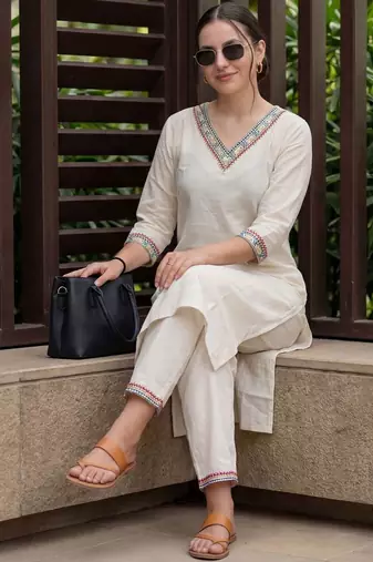Women Ethnic Motifs Embroidered Regular Mirror Work Kurta with Trousers